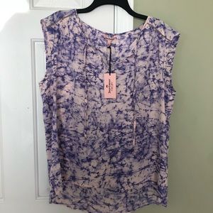 Juicy Couture women’s sleeveless blouse.